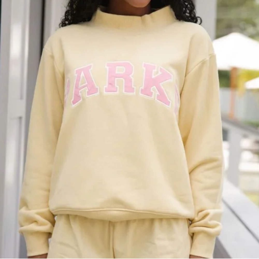 Stylish PARKE Yellow Mock Neck Sweatshirt with Pink Accents
